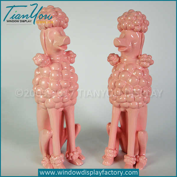 French poodle dog statues